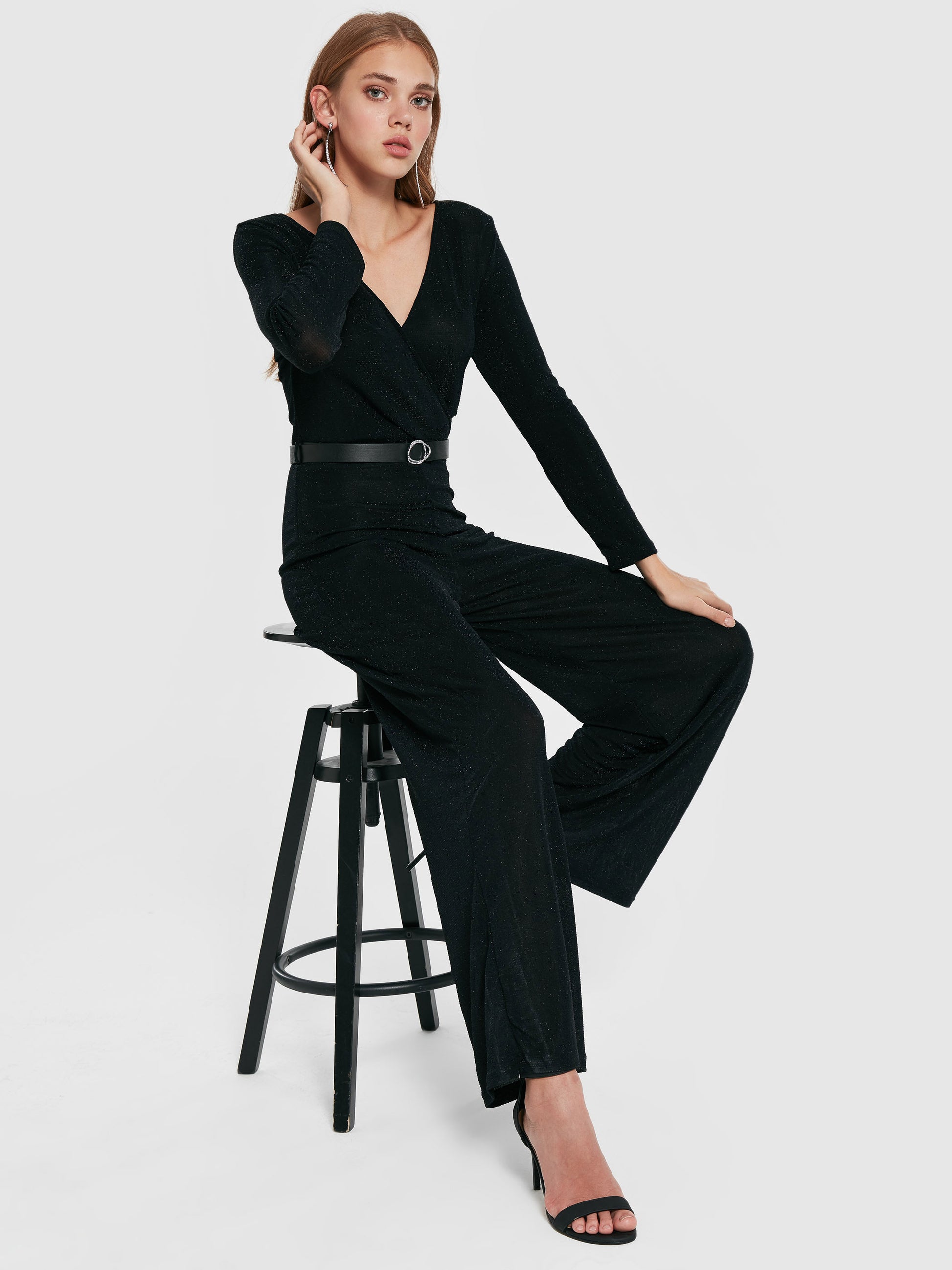 Eleganter Damen Overall Jumpsuit mit hohem Bund, Glitzer, transparentem Stoff und schmaler Passform, ideal für besondere Anlässe.