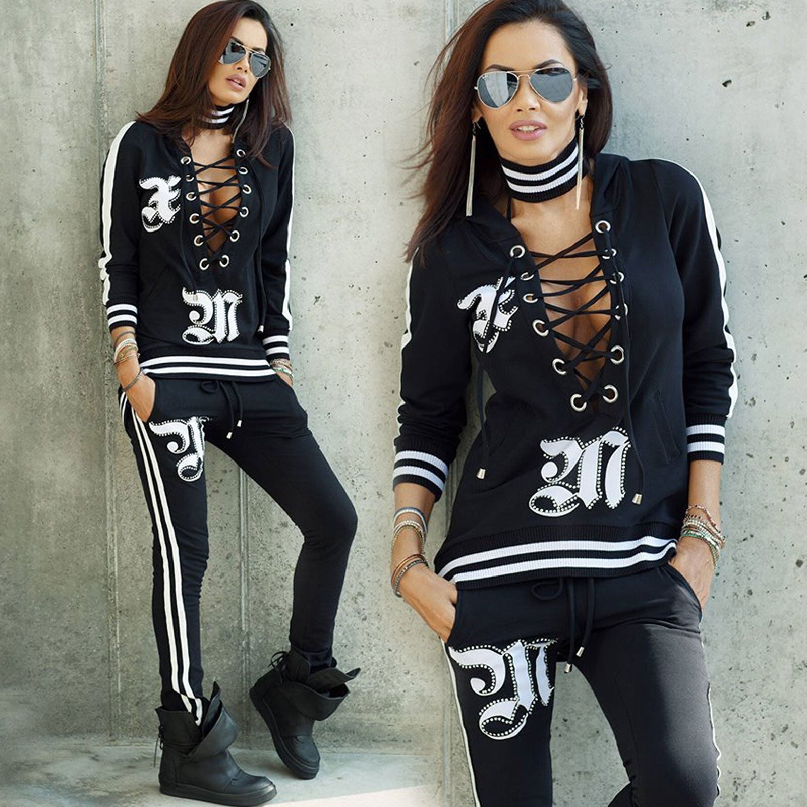 Damen 2-Teiler Freizeitanzug von Mexton, schwarzer Pullover und Jogginghose im sportlichen Stil, bequem und casual.